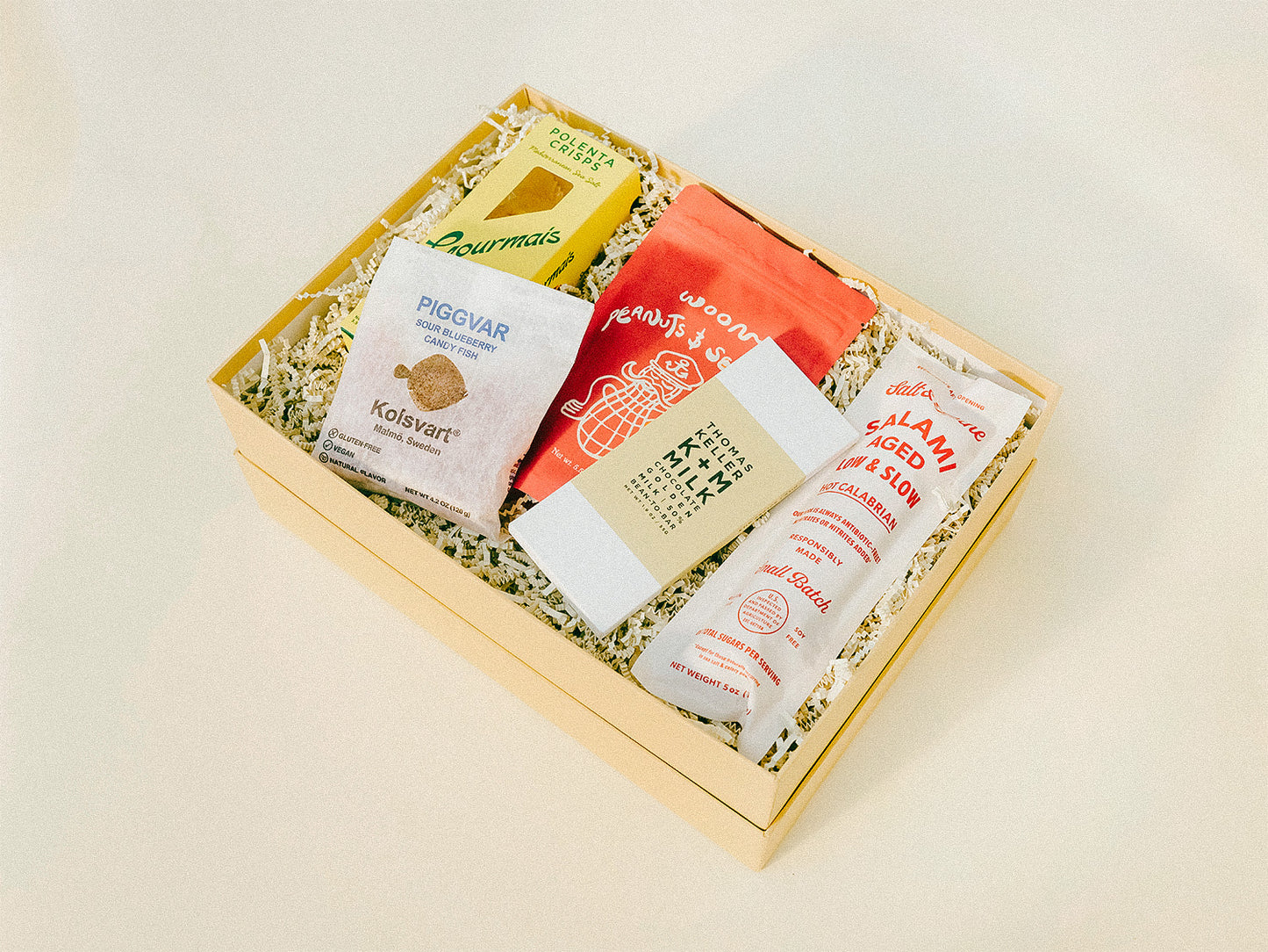 Gift box with specialty food, snacks, and chocolate.