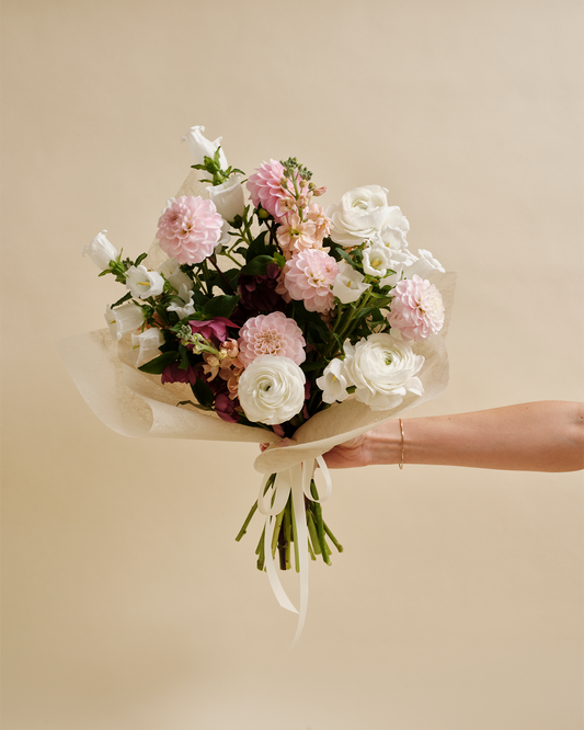 Hand-tied bouquet of garden-style seasonal flowers