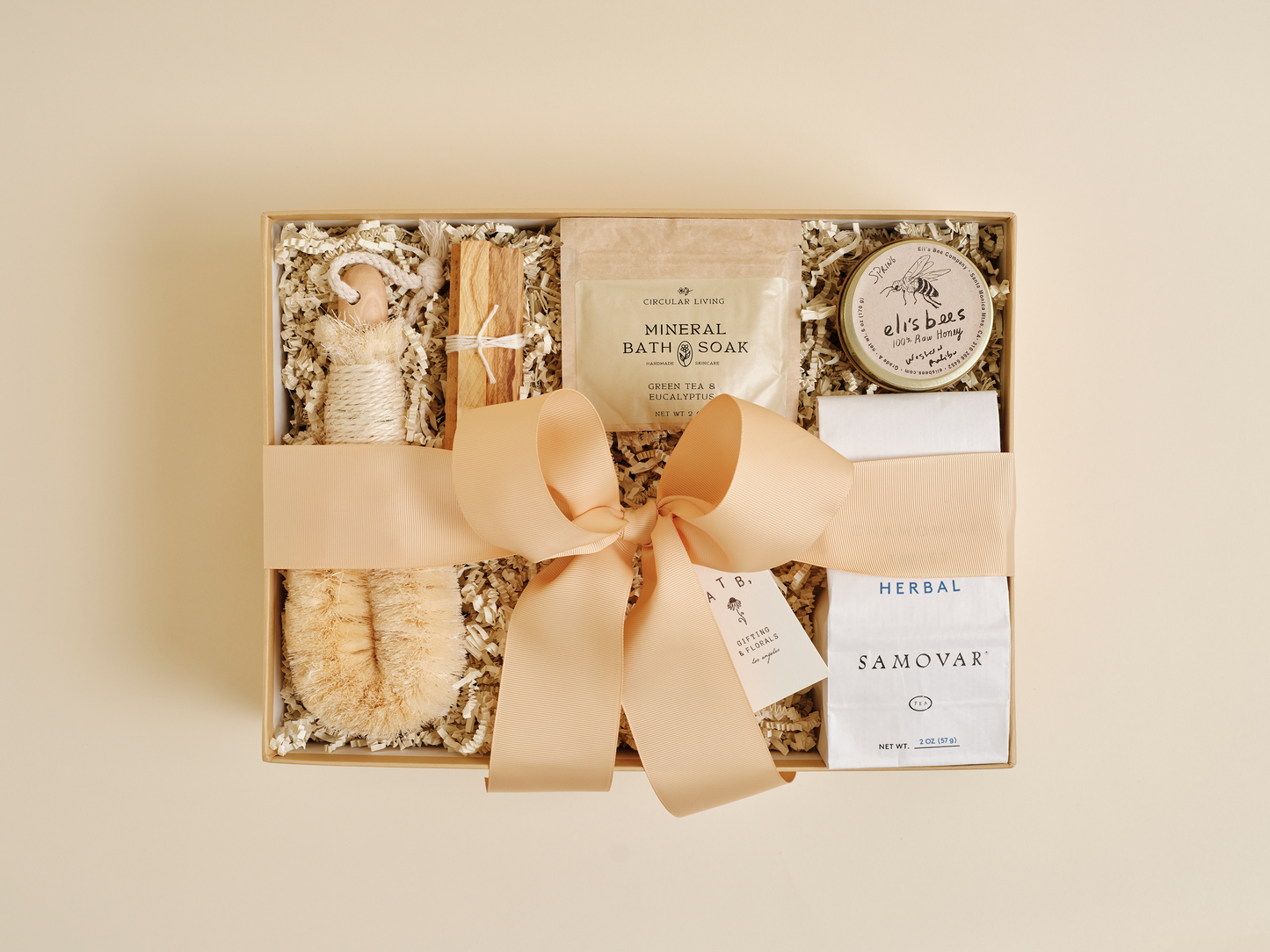 Luxury spa gift box with herbal tea, bath soak, and wellness products