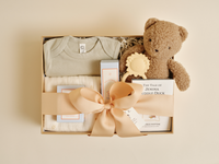 New baby gift box with baby essentials and soft keepsake items