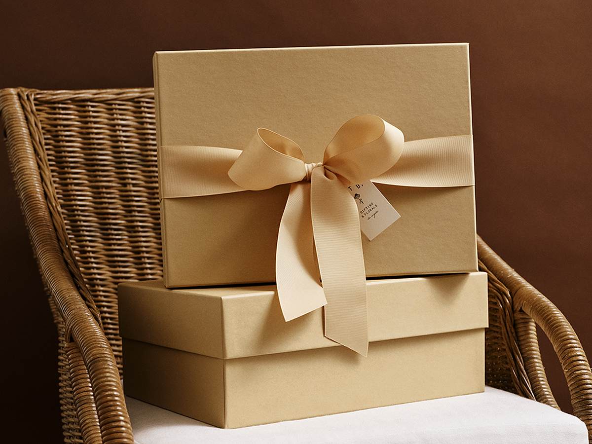 Stacked kraft gift boxes with ribbon for custom gifts