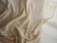 Mushie muslin swaddle from the Welcome Baby Deluxe box
