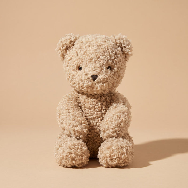 Oatmeal sherpa teddy bear sitting upright