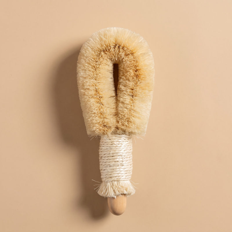 Natural dry body brush with sisal bristles and a cord-wrapped handle